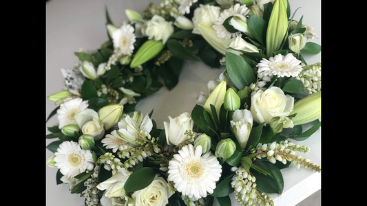 Elegant white wreath for sympathy and funeral services Auckland